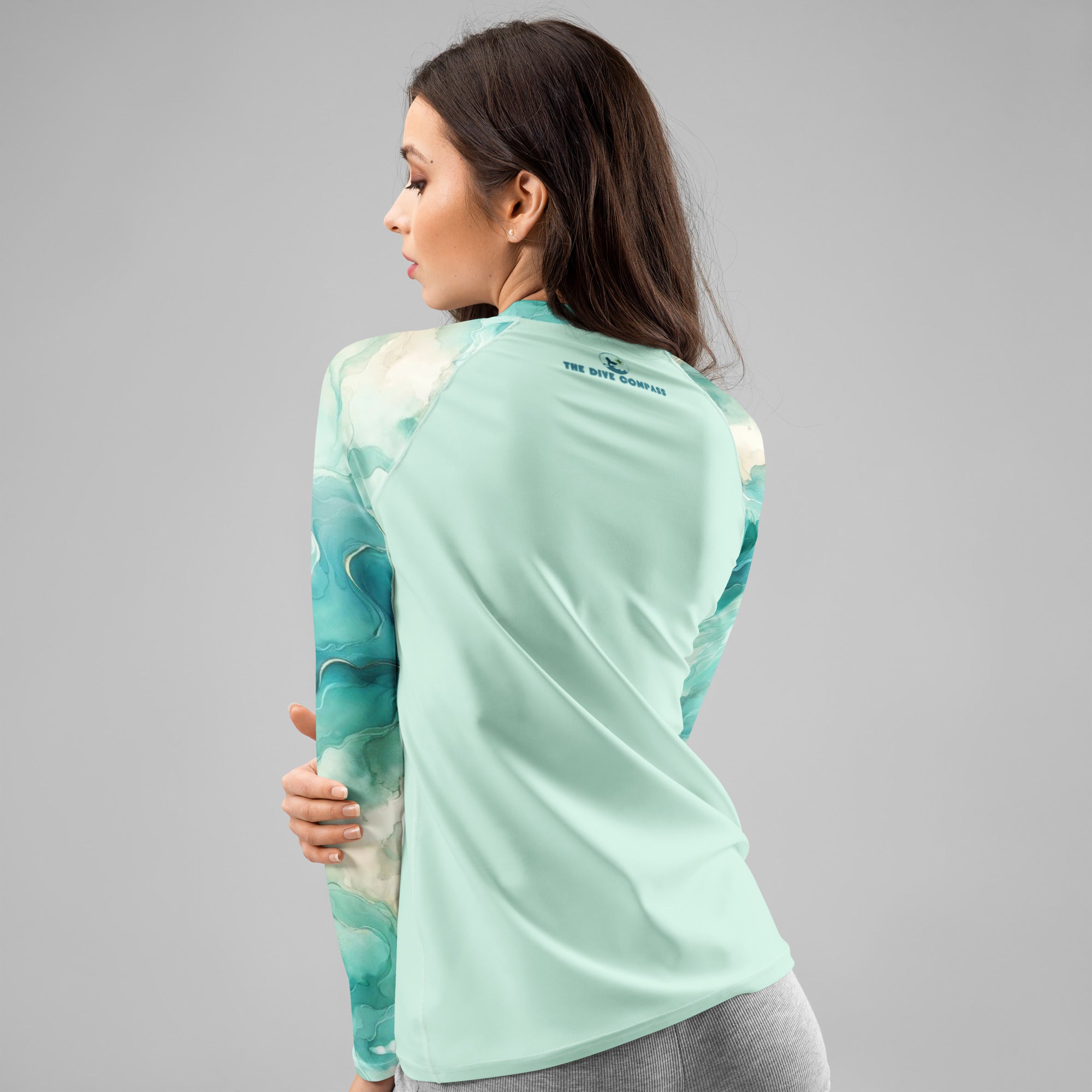 Turquoise Seas Women's Rash Guard – back view – sustainable women's rash guard in soft recycled polyester for divers
